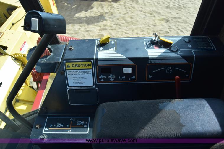 image for item K8668 1996 New Holland 2450 self-propelled windrower