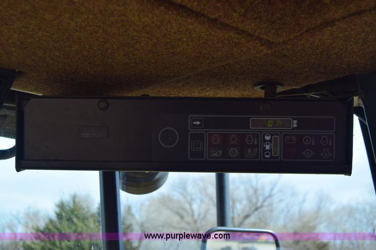 image for item K8668 1996 New Holland 2450 self-propelled windrower