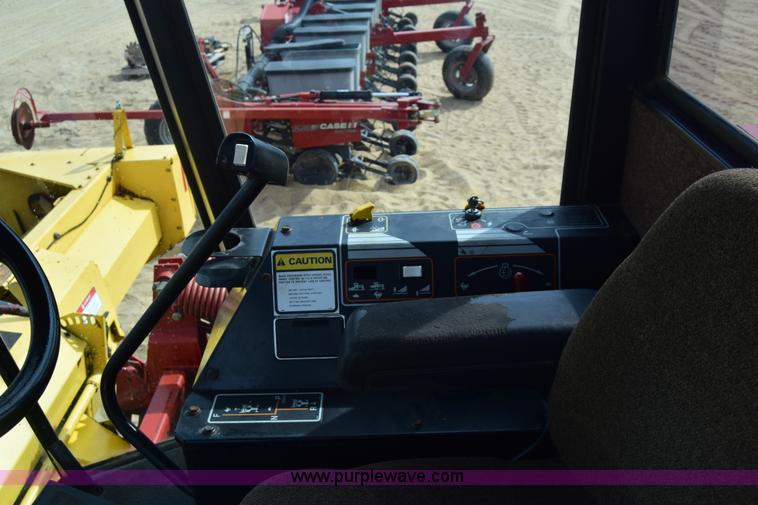 image for item K8668 1996 New Holland 2450 self-propelled windrower