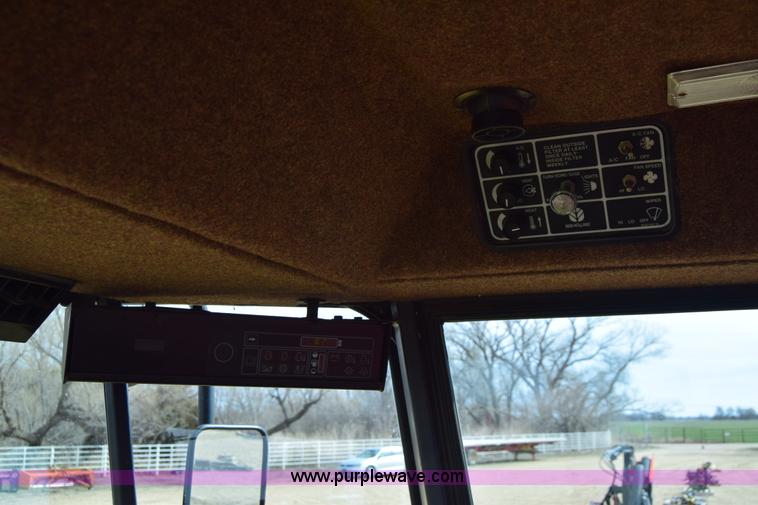 image for item K8668 1996 New Holland 2450 self-propelled windrower