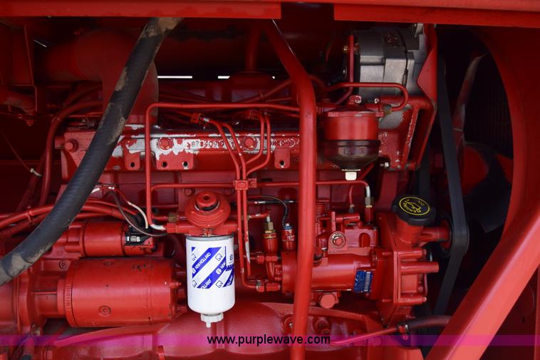 image for item K8668 1996 New Holland 2450 self-propelled windrower