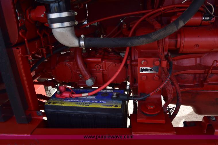 image for item K8668 1996 New Holland 2450 self-propelled windrower