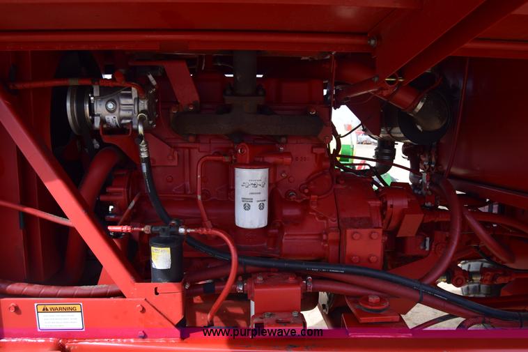 image for item K8668 1996 New Holland 2450 self-propelled windrower