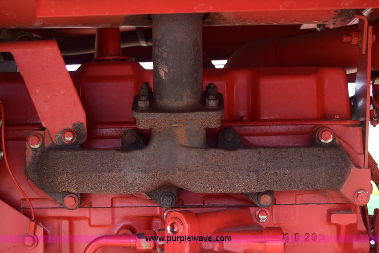 image for item K8668 1996 New Holland 2450 self-propelled windrower