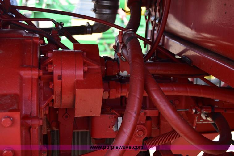 image for item K8668 1996 New Holland 2450 self-propelled windrower