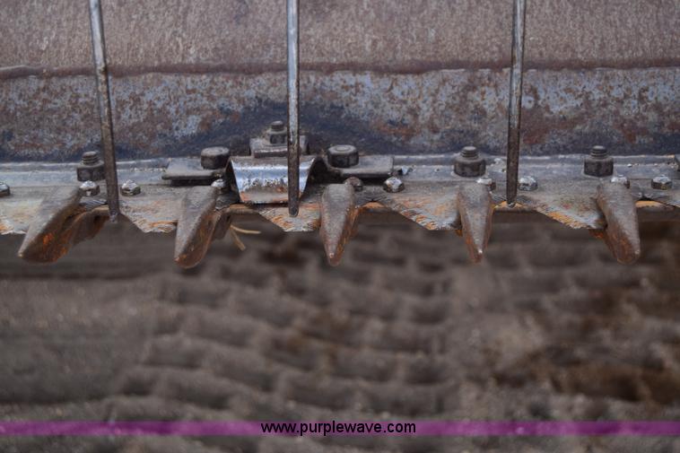 image for item K8668 1996 New Holland 2450 self-propelled windrower