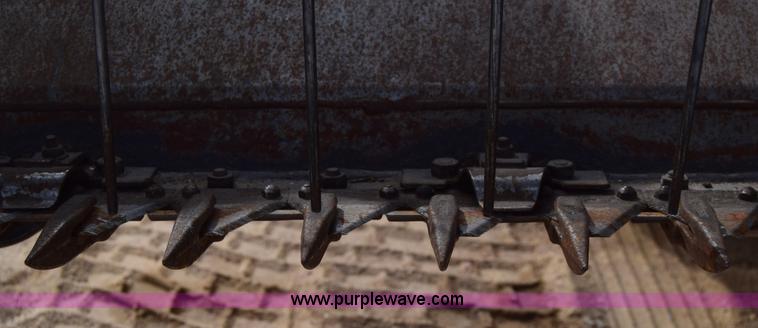 image for item K8668 1996 New Holland 2450 self-propelled windrower