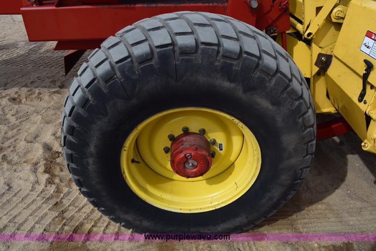 image for item K8668 1996 New Holland 2450 self-propelled windrower