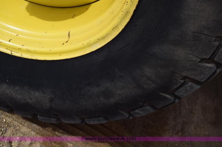 image for item K8668 1996 New Holland 2450 self-propelled windrower