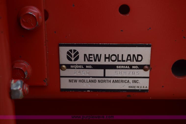 image for item K8668 1996 New Holland 2450 self-propelled windrower