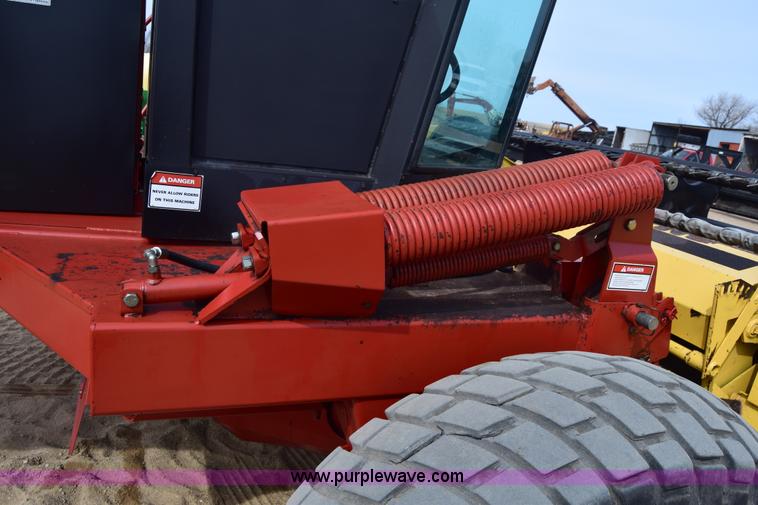 image for item K8668 1996 New Holland 2450 self-propelled windrower