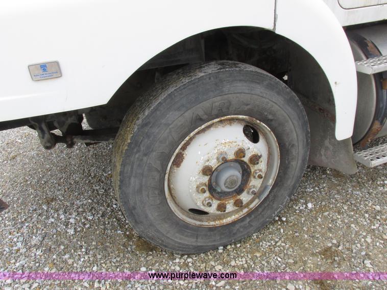 image for item L7104 1995 Volvo WG seed tender truck