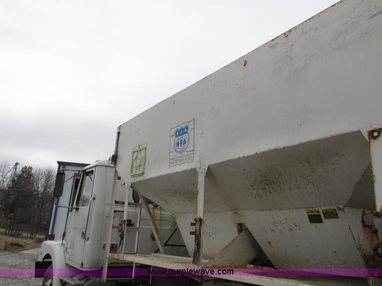 image for item L7104 1995 Volvo WG seed tender truck