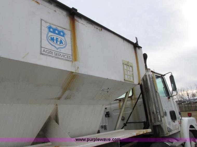 image for item L7104 1995 Volvo WG seed tender truck