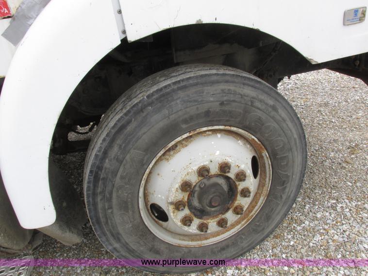 image for item L7104 1995 Volvo WG seed tender truck