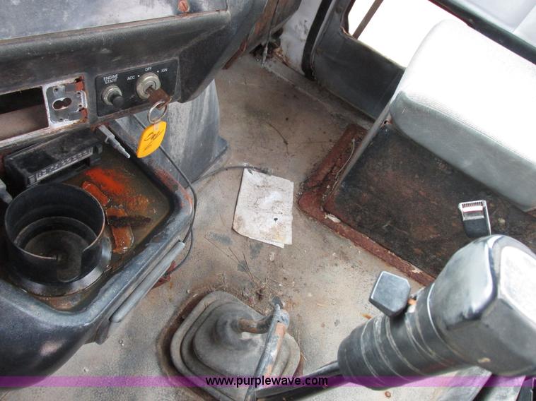 image for item L7104 1995 Volvo WG seed tender truck