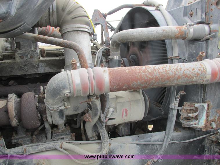 image for item L7104 1995 Volvo WG seed tender truck