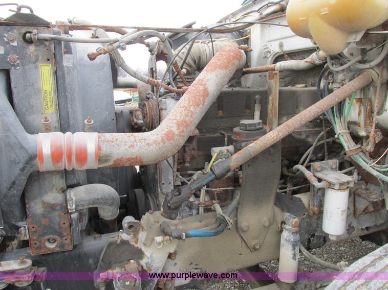 image for item L7104 1995 Volvo WG seed tender truck