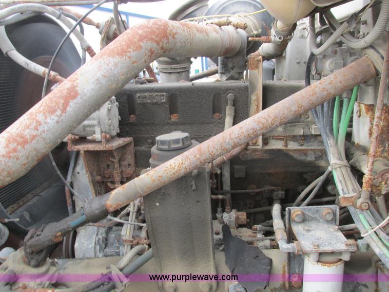 image for item L7104 1995 Volvo WG seed tender truck