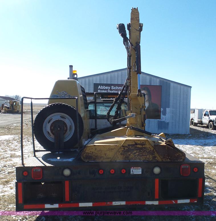 image for item AX9224 2006 Ford F550 flatbed truck with Tiger Rail Kat boom mower