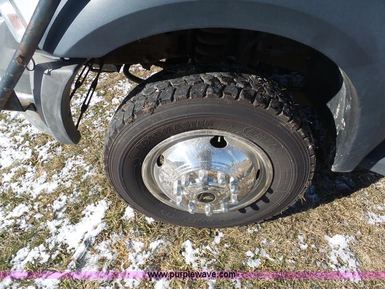 image for item AX9224 2006 Ford F550 flatbed truck with Tiger Rail Kat boom mower