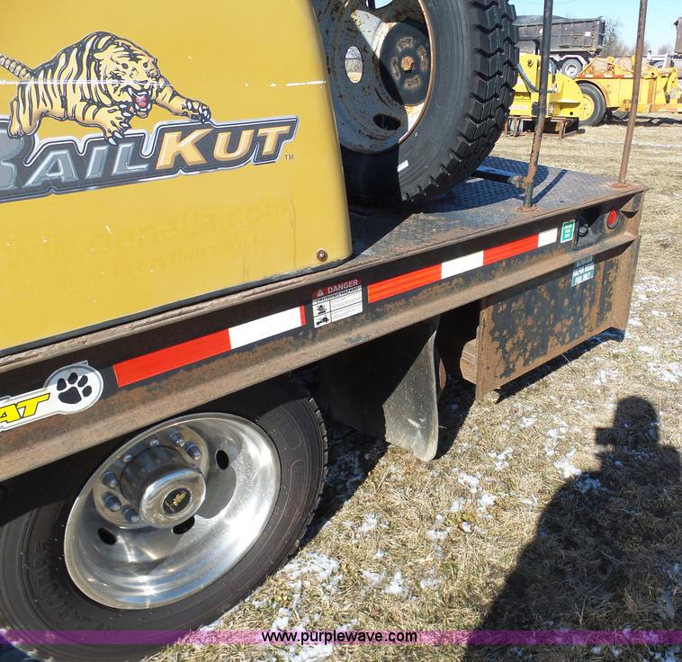 image for item AX9224 2006 Ford F550 flatbed truck with Tiger Rail Kat boom mower