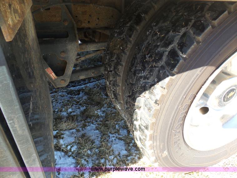 image for item AX9224 2006 Ford F550 flatbed truck with Tiger Rail Kat boom mower