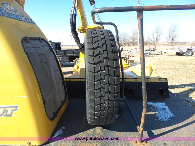 image for item AX9224 2006 Ford F550 flatbed truck with Tiger Rail Kat boom mower