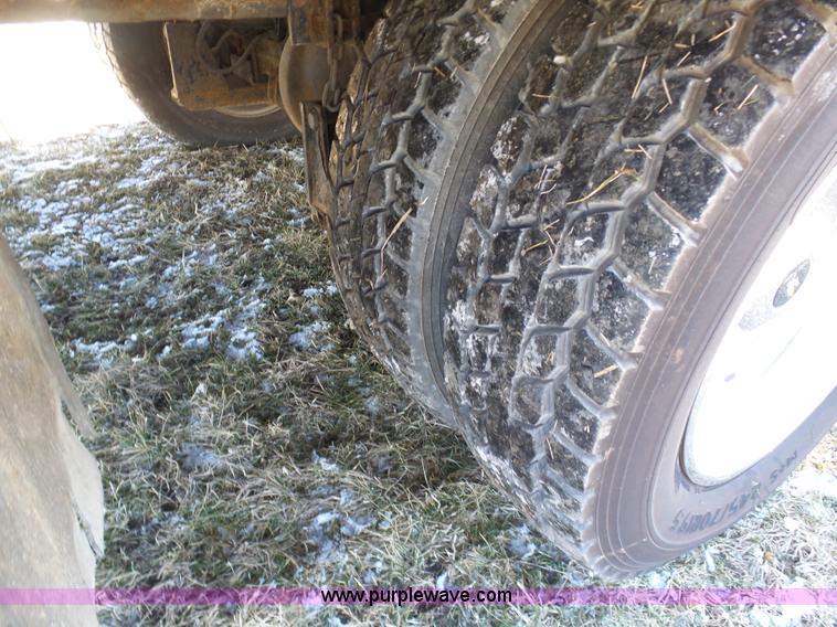 image for item AX9224 2006 Ford F550 flatbed truck with Tiger Rail Kat boom mower