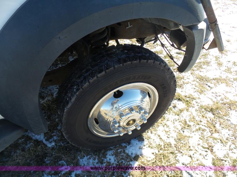 image for item AX9224 2006 Ford F550 flatbed truck with Tiger Rail Kat boom mower