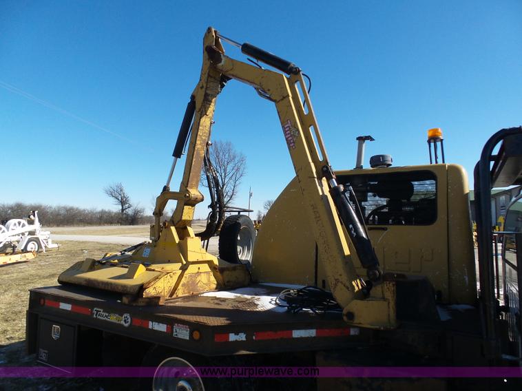 image for item AX9224 2006 Ford F550 flatbed truck with Tiger Rail Kat boom mower