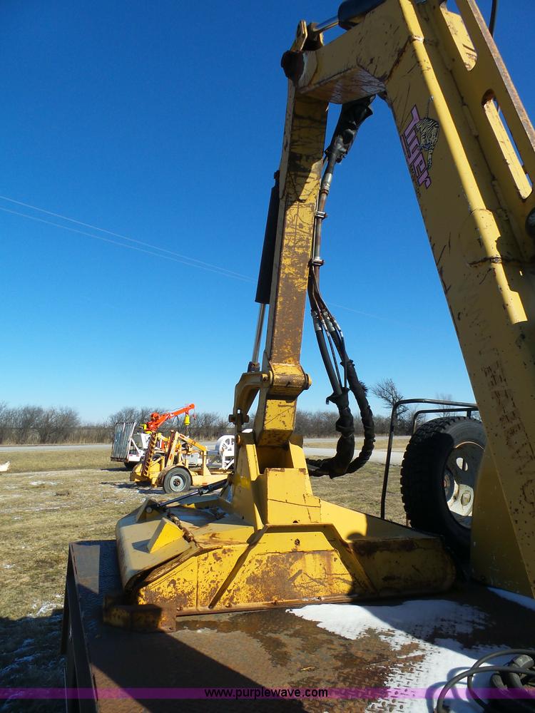 image for item AX9224 2006 Ford F550 flatbed truck with Tiger Rail Kat boom mower