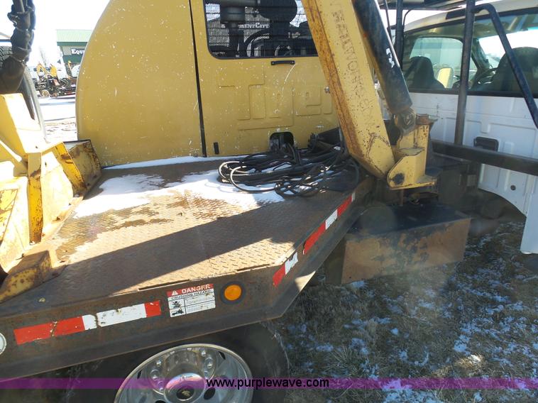 image for item AX9224 2006 Ford F550 flatbed truck with Tiger Rail Kat boom mower