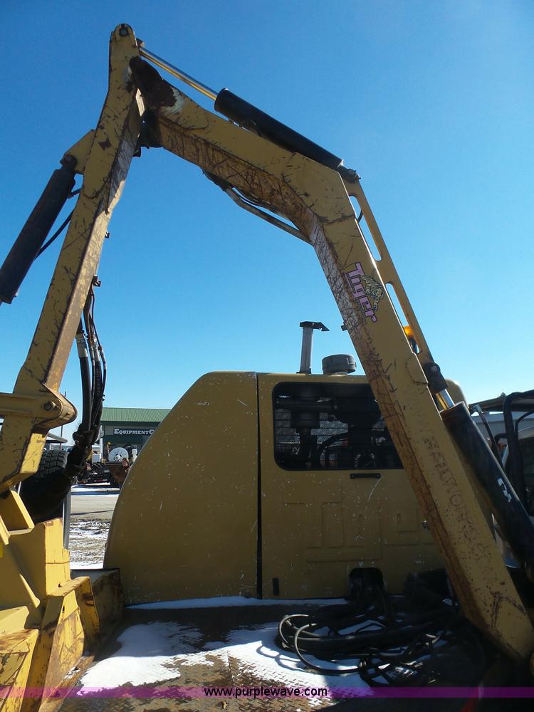 image for item AX9224 2006 Ford F550 flatbed truck with Tiger Rail Kat boom mower