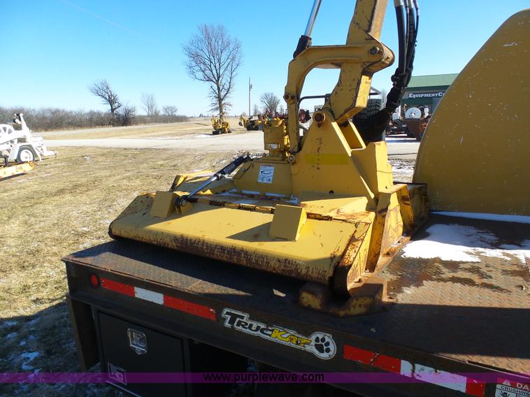 image for item AX9224 2006 Ford F550 flatbed truck with Tiger Rail Kat boom mower