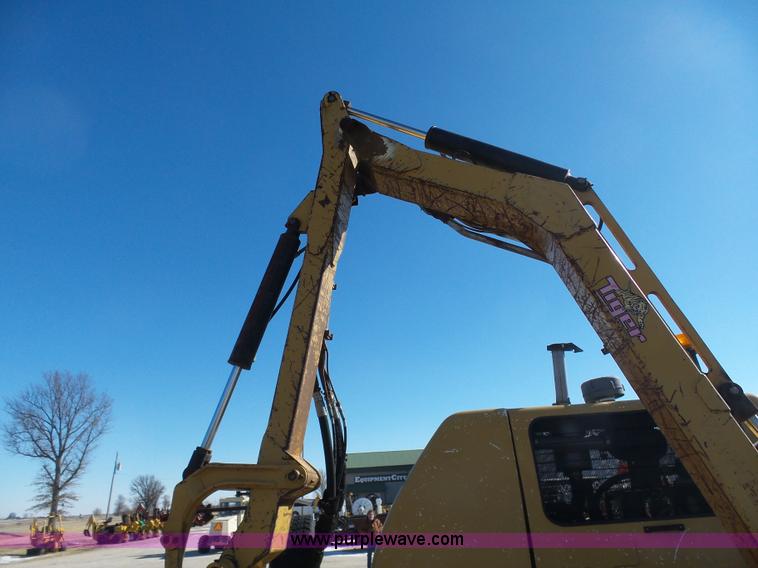 image for item AX9224 2006 Ford F550 flatbed truck with Tiger Rail Kat boom mower