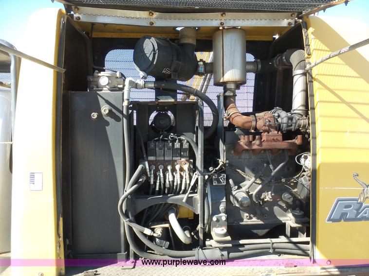 image for item AX9224 2006 Ford F550 flatbed truck with Tiger Rail Kat boom mower