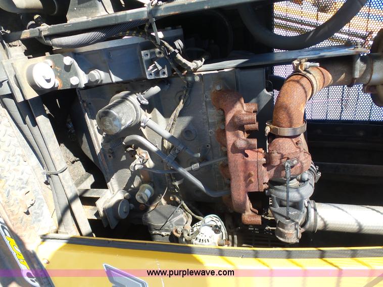 image for item AX9224 2006 Ford F550 flatbed truck with Tiger Rail Kat boom mower