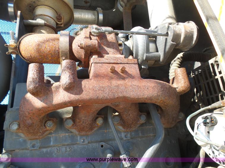 image for item AX9224 2006 Ford F550 flatbed truck with Tiger Rail Kat boom mower