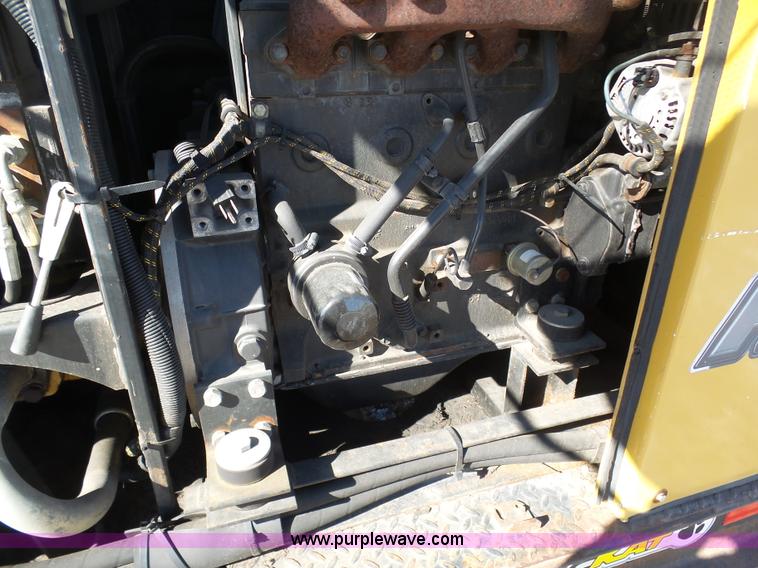 image for item AX9224 2006 Ford F550 flatbed truck with Tiger Rail Kat boom mower