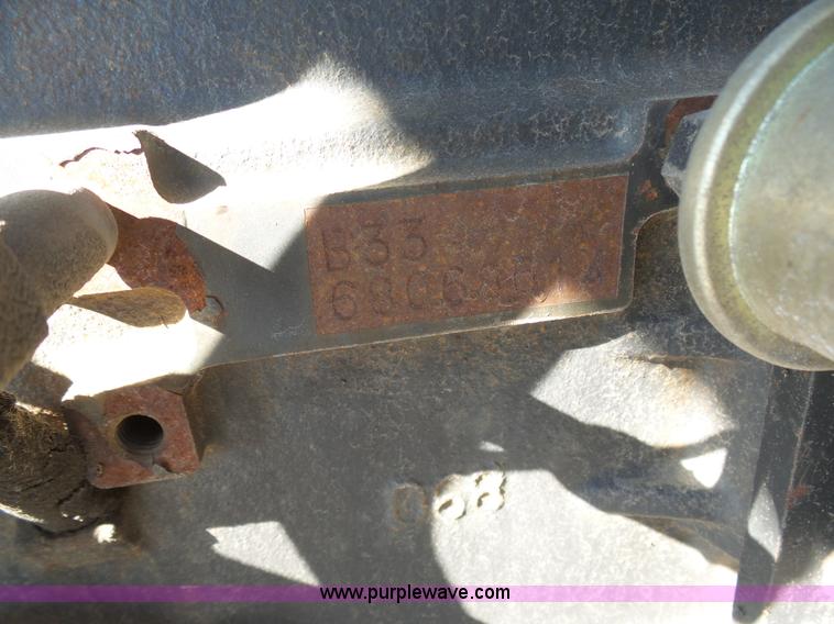 image for item AX9224 2006 Ford F550 flatbed truck with Tiger Rail Kat boom mower