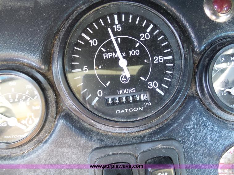 image for item AX9224 2006 Ford F550 flatbed truck with Tiger Rail Kat boom mower