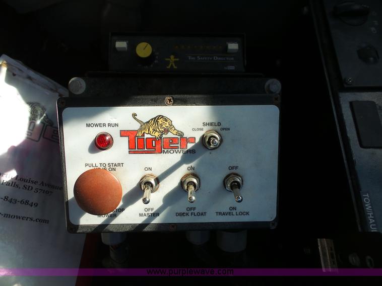 image for item AX9224 2006 Ford F550 flatbed truck with Tiger Rail Kat boom mower