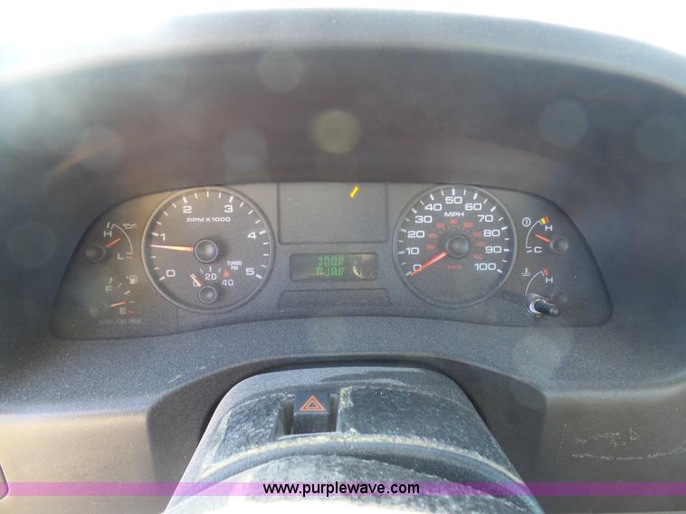 image for item AX9224 2006 Ford F550 flatbed truck with Tiger Rail Kat boom mower