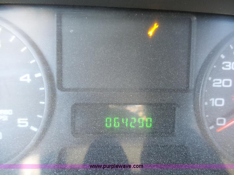 image for item AX9224 2006 Ford F550 flatbed truck with Tiger Rail Kat boom mower