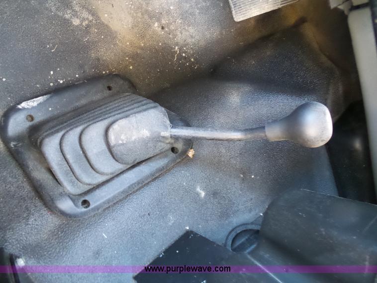 image for item AX9224 2006 Ford F550 flatbed truck with Tiger Rail Kat boom mower