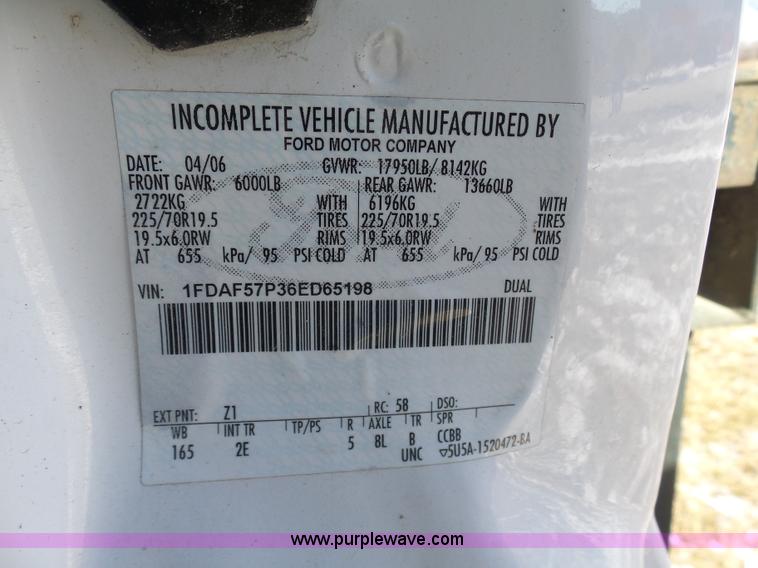 image for item AX9224 2006 Ford F550 flatbed truck with Tiger Rail Kat boom mower