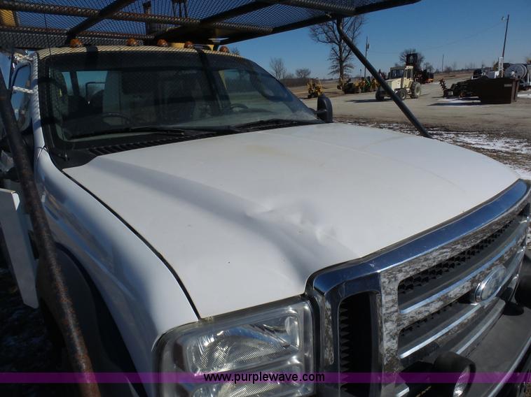 image for item AX9224 2006 Ford F550 flatbed truck with Tiger Rail Kat boom mower