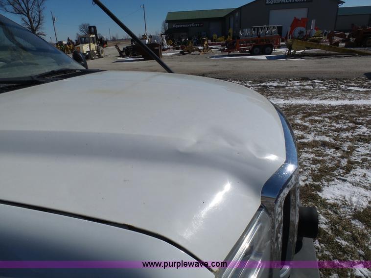 image for item AX9224 2006 Ford F550 flatbed truck with Tiger Rail Kat boom mower