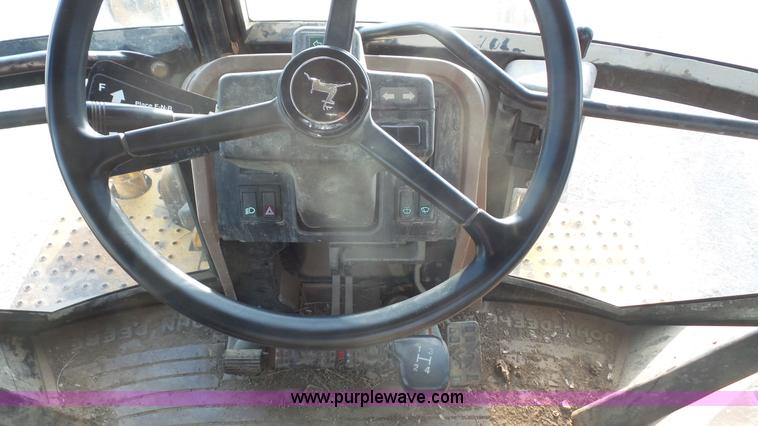 image for item J4701 1992 John Deere 410D backhoe